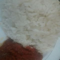 A picture of White rice and stew.