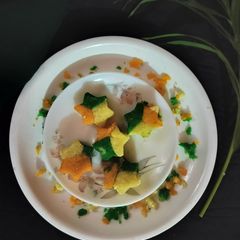 A picture of Tri colour star shape semolina sandesh.