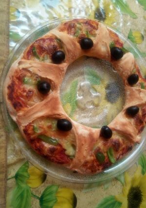 Une photo de Pizza couronne 🍕