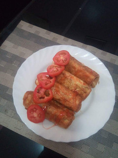 A picture of Sausage rolled in French toast.