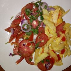 A picture of Chips with Kachumbari.