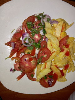 A picture of Chips with Kachumbari.