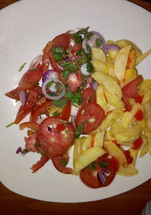 A picture of Chips with Kachumbari.