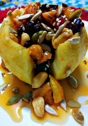 A picture of Stuffed Dryfruits in Baked Apple.