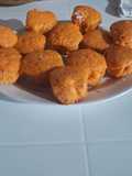 Muffins anaranjado rellenos con coco