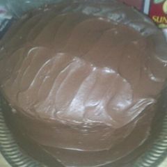 A picture of Mile high chocolate cake.