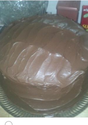 A picture of Mile high chocolate cake.