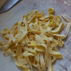 A picture of Yellow hand made pasta.