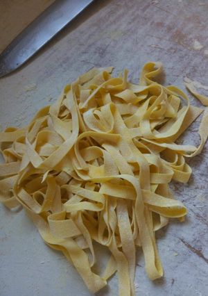 A picture of Yellow hand made pasta.