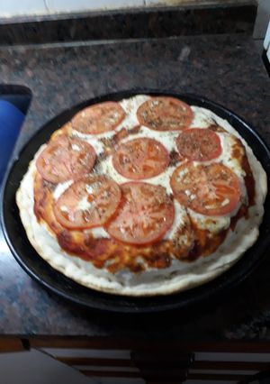 Una foto de Pizza rellena. grace