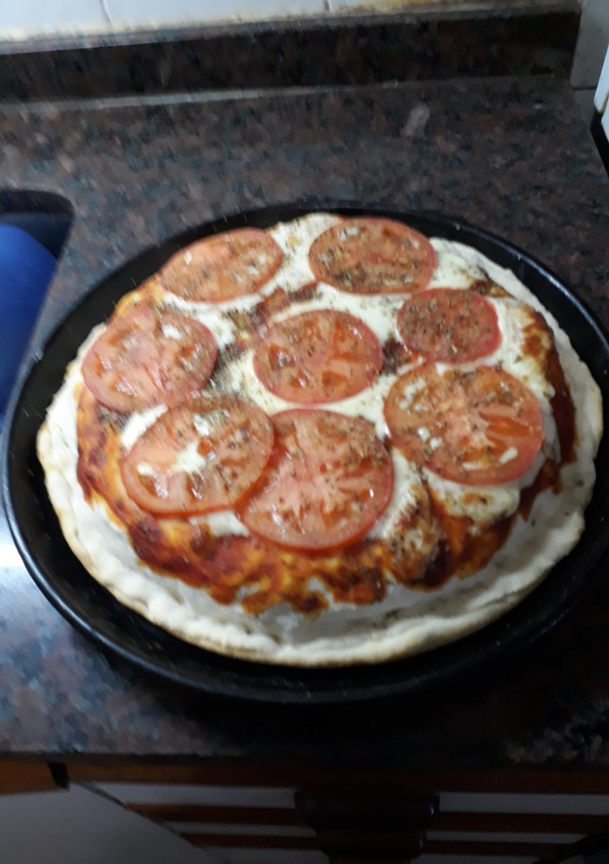 Una foto de Pizza rellena. grace