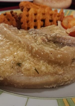 A picture of Pork Chops Cooked in Milk and Herbs.