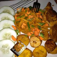 A picture of Pasta,fried plantain and veggies.