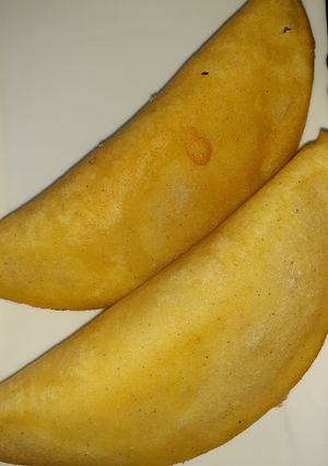 Una foto de Empanadas de perico (huevo guisado) con guasacaca
