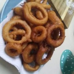 A picture of Homemade fried onion rings.