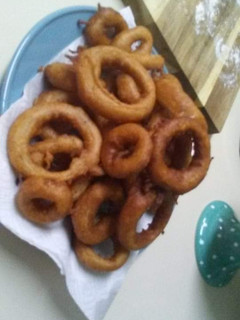 A picture of Homemade fried onion rings.