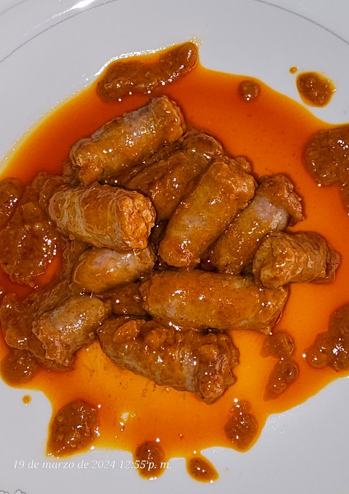 Una foto de Salchichas en salsa koreana de curry rojo