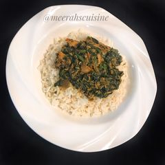 A picture of White rice and vegetable sauce.