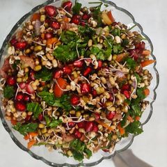 Mixed sprouts and veggies salad with pomegranates A picture of Mixed sprouts and veggies salad with pomegranates.