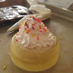 A picture of Candy bowls with homemade whipped cream.