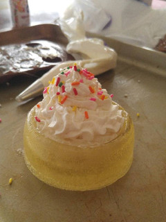 A picture of Candy bowls with homemade whipped cream.