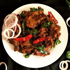 A picture of Madurai Mutton Chukka.