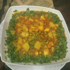 A picture of Matar aloo paneer.