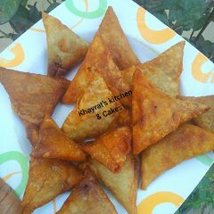 A picture of Samosa wrap& folding method recipe.