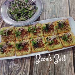 A picture of Avocado Microgreens Canapes.