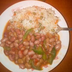 A picture of Vegetable Rice with Stewed beans.