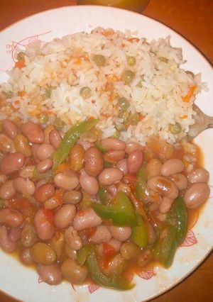 A picture of Vegetable Rice with Stewed beans.