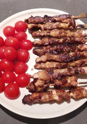 A picture of Grilled Chicken Skewers with Cherry Tomatoes.