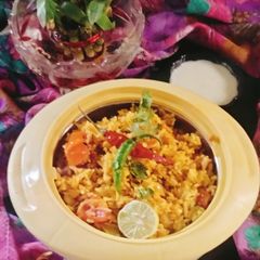 A picture of Tomato pulao 🍅 veg Tomato 🍅 pulao 😋.
