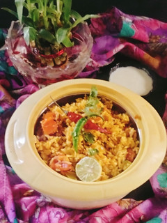 A picture of Tomato pulao 🍅 veg Tomato 🍅 pulao 😋.
