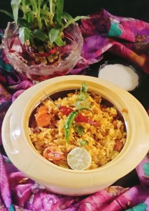 A picture of Tomato pulao 🍅 veg Tomato 🍅 pulao 😋.