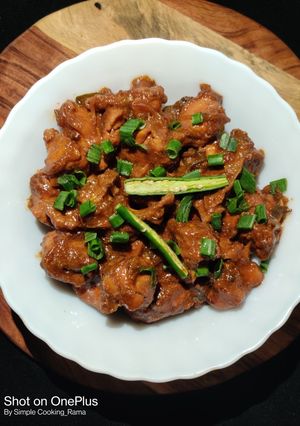 A picture of Chilli Chicken with Sauces.