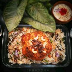 Tandoori Gobi Mussallam Biryani A picture of Tandoori Gobi Mussallam Biryani.