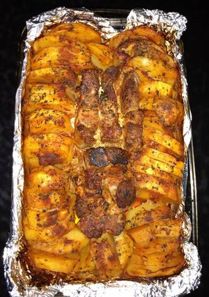 Una foto de Bondiola de cerdo con Papas+calabaza al horno 👇