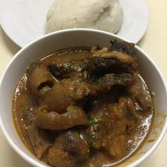A picture of Ogbono soup and assorted.