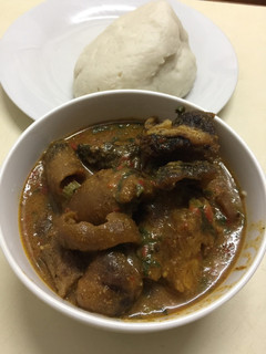 A picture of Ogbono soup and assorted.