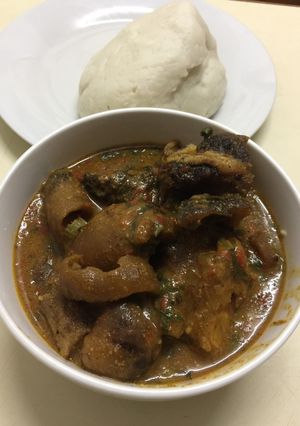 A picture of Ogbono soup and assorted.