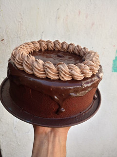 Una foto de Pastel pulverizado de chocolate