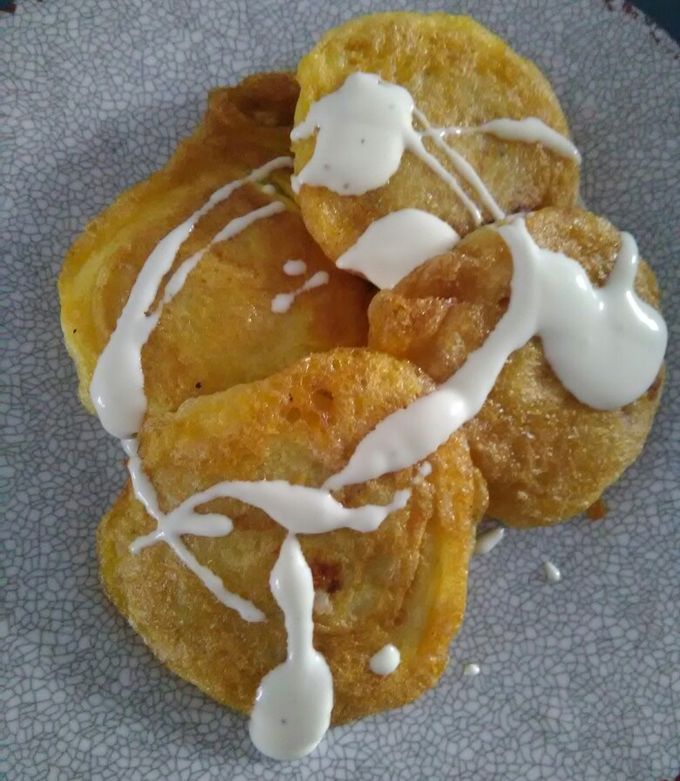 Una foto de Tortas de papa capeadas