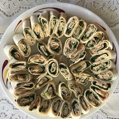 Pin wheel spinach and cheese wraps A picture of Pin wheel spinach and cheese wraps.