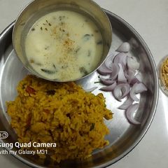 A picture of Jain kadhi and masala khichdi.