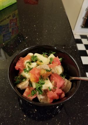 A picture of Sausage tomato francese over ricotta gnocchi.