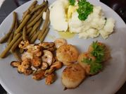 A picture of squid with potatoes