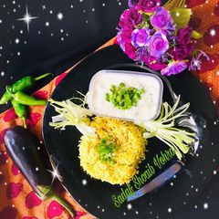 A picture of “Smokey Brinjal & Spring Onion Raita”.