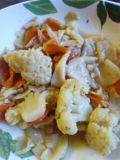 Una foto de Coliflor en caldo de pollo