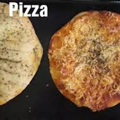 Pizza and garlic bread A picture of Pizza and garlic bread.